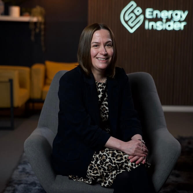 Gemma Douglas, Disembarkation Specialist is sitting on a chair