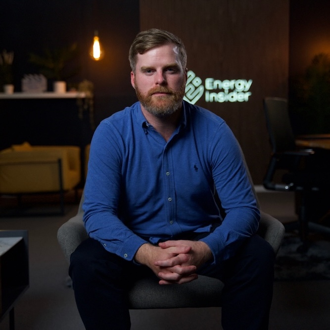 Joe Leask Decommissioning Strategy Lead at BP sitting on a chair